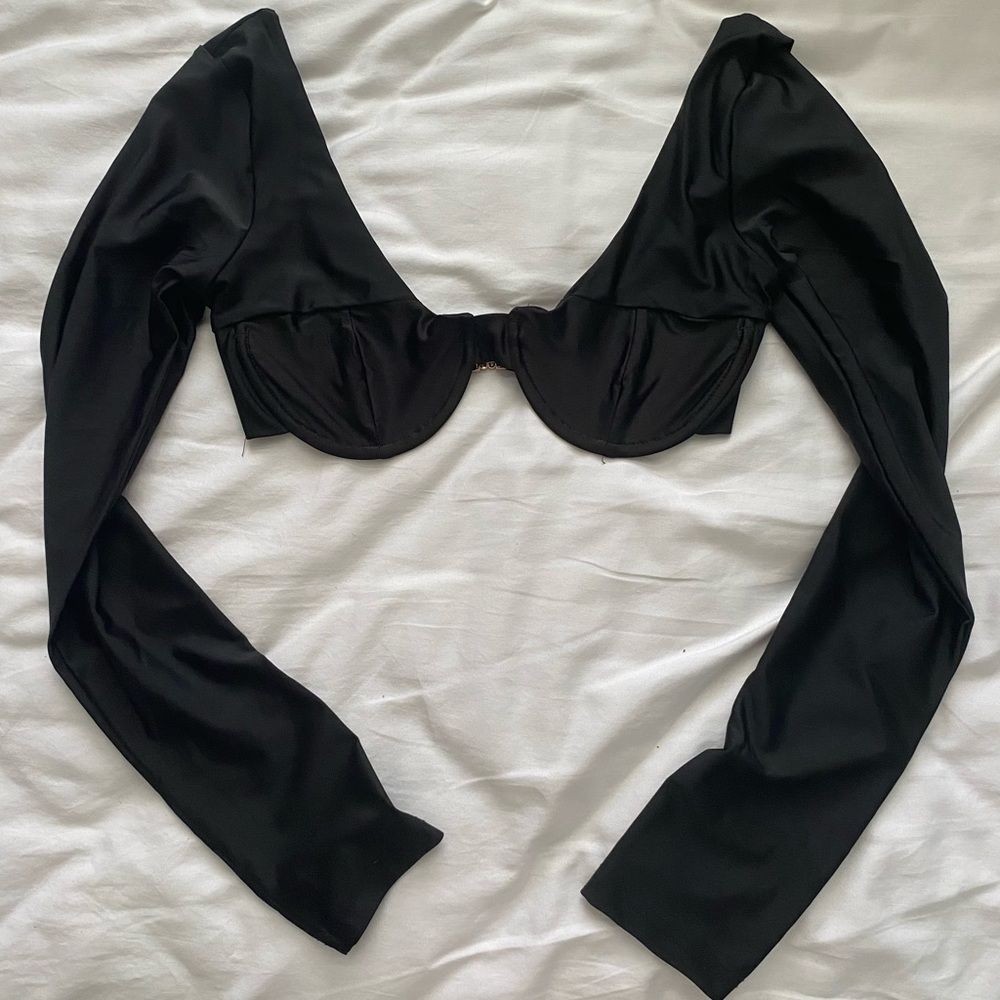 Going out black top with clasp back, size small